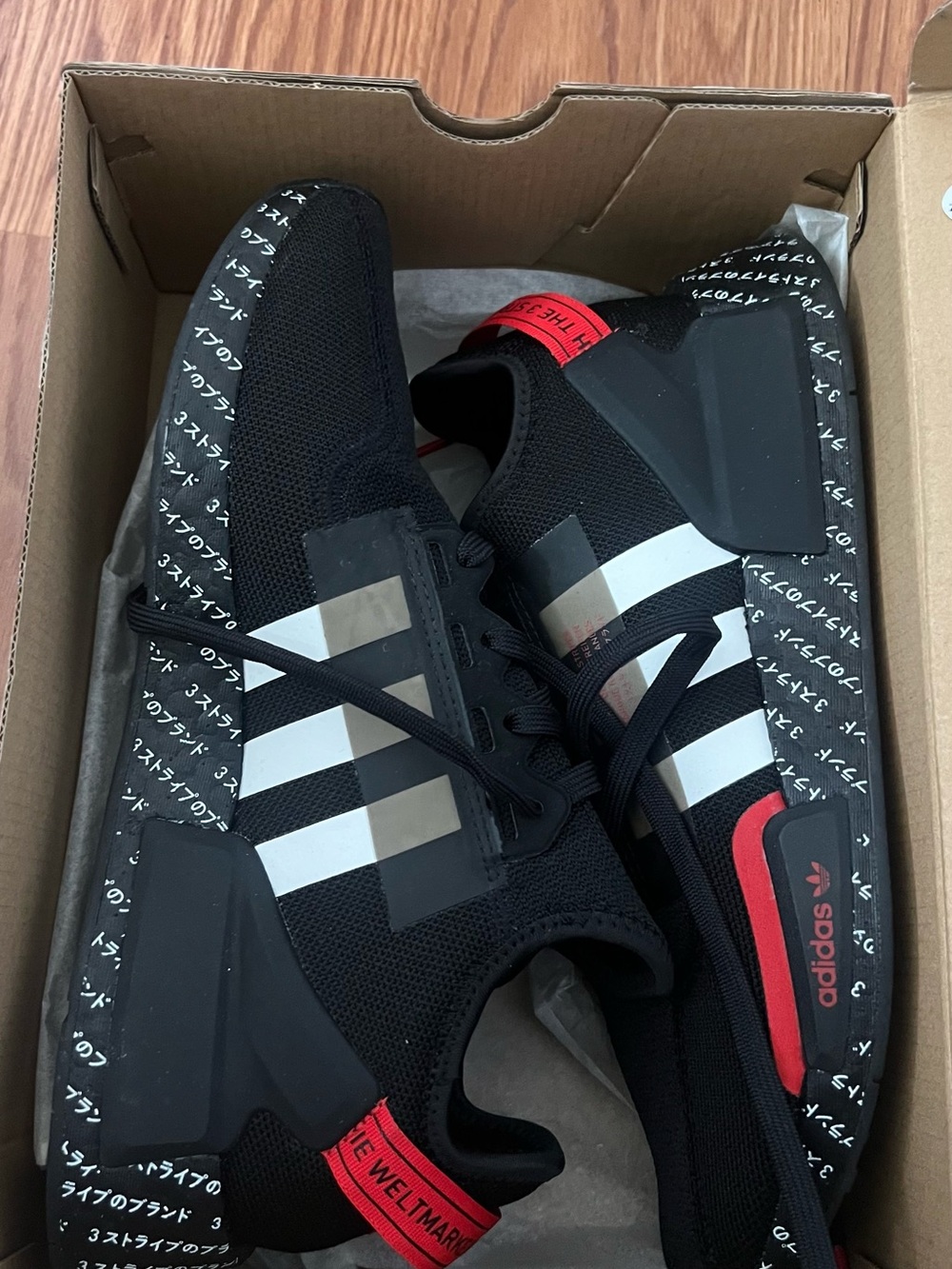 adidas Black Sneakers with White Stripes and Red Accents